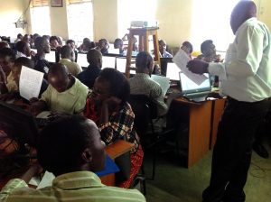 Teachers in a past retooling workshop at Kololo SSS